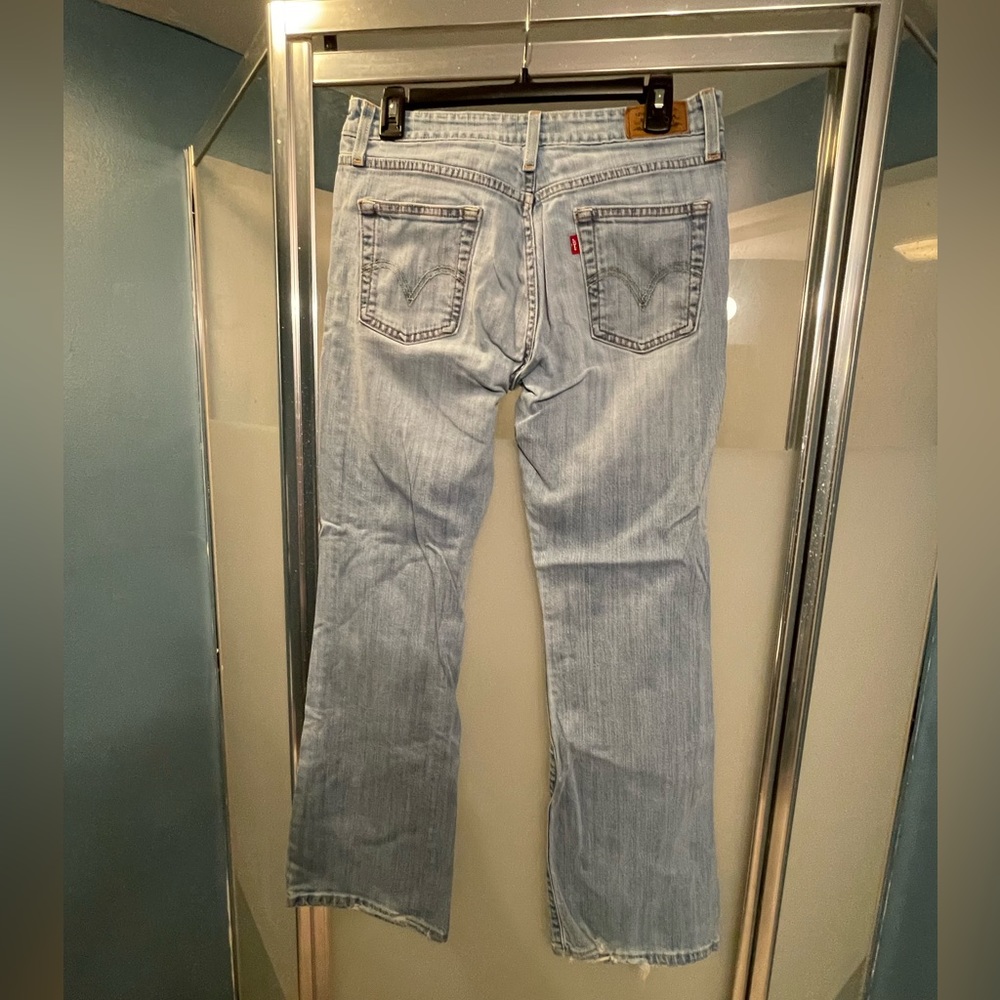 Y2K women’s Levi 519 light wash jeans pre-loved some wear on cuffs size 9M